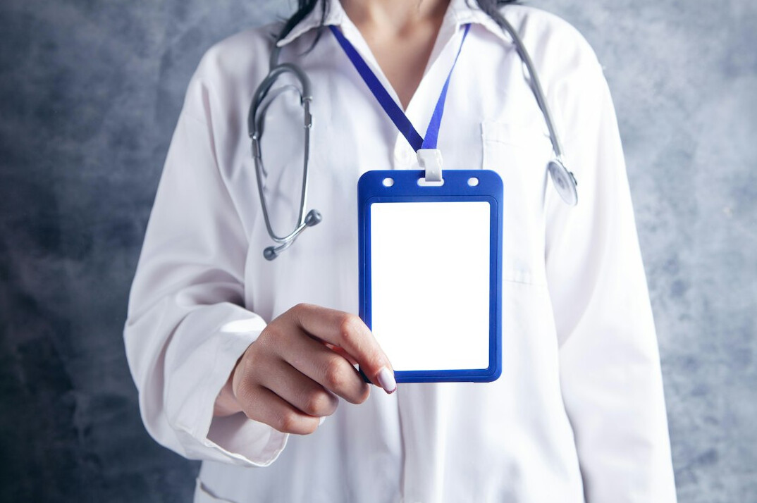 Nurse holding a clipboard in a modern clinic