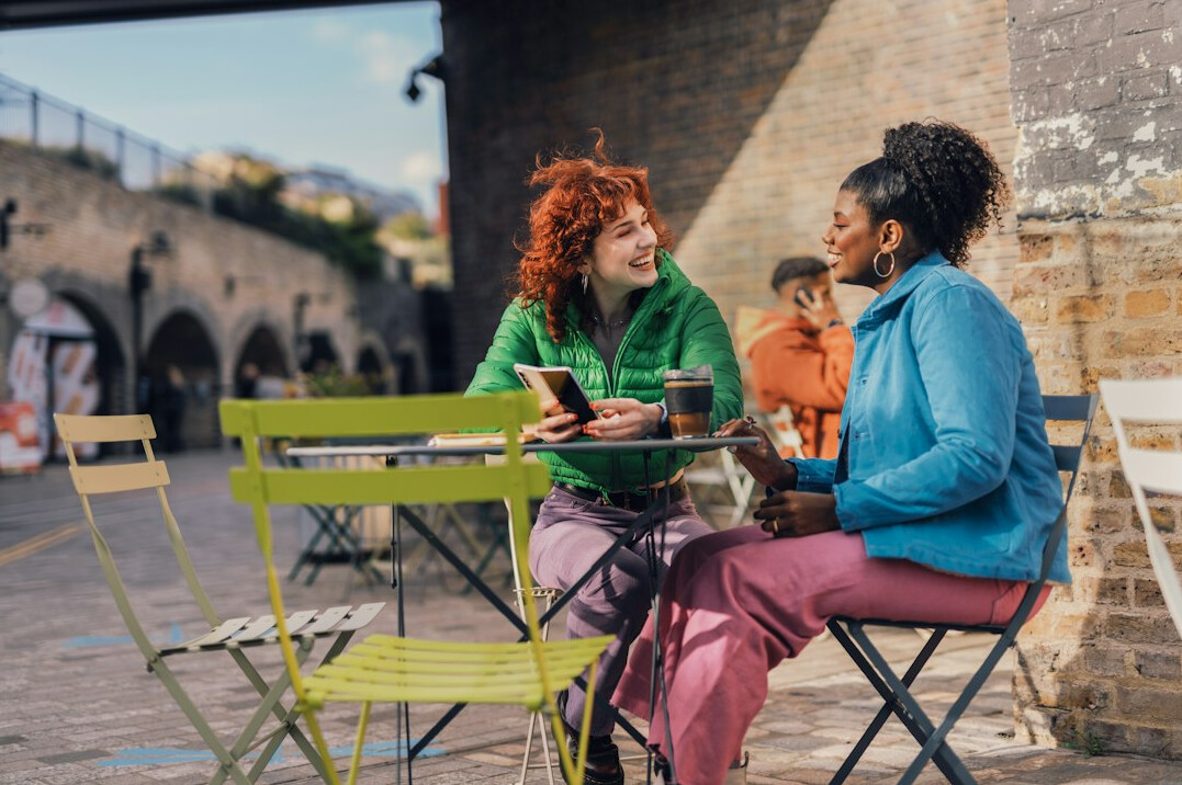 diverse people sharing stories