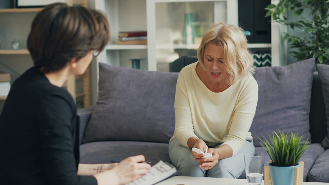 health insurance advisor talking to client