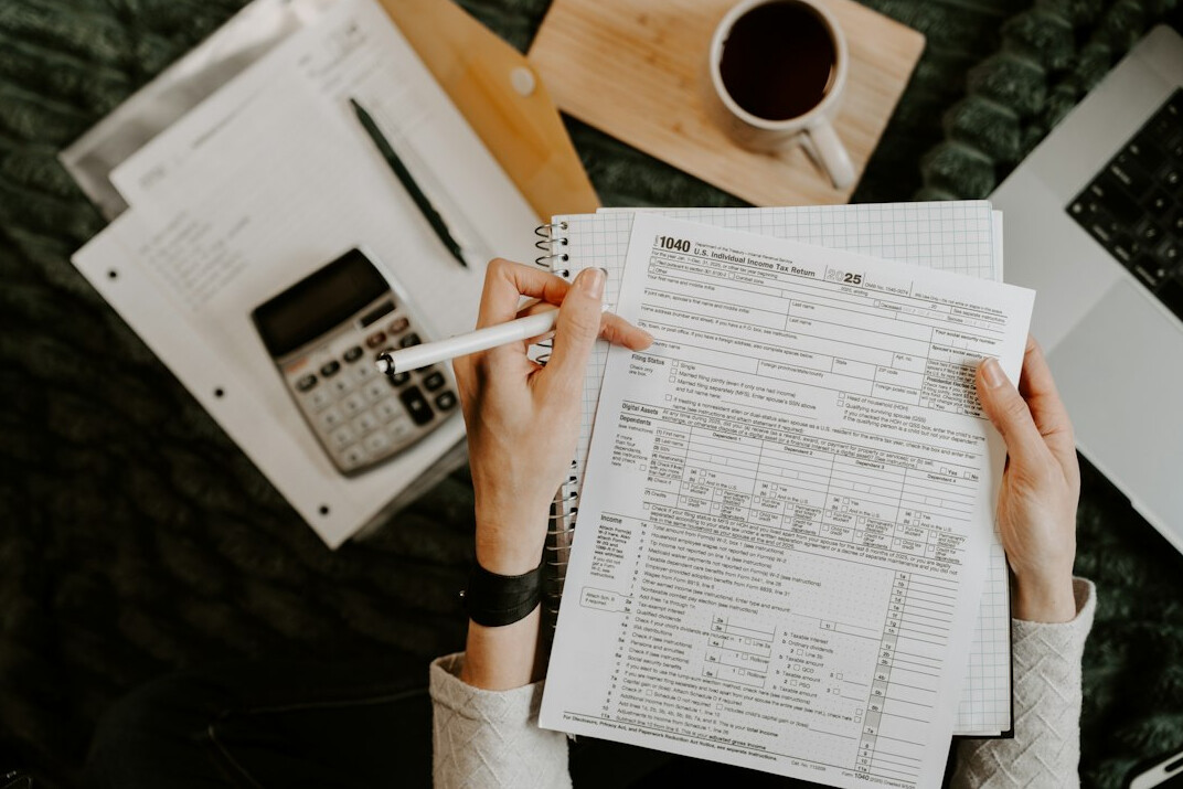 person calculating insurance costs